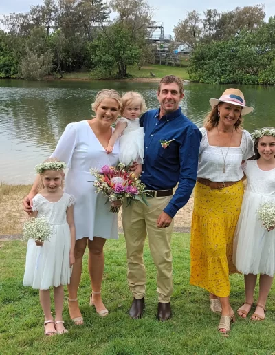 young family posing with bronwyn brown gold coast marriage celebrant