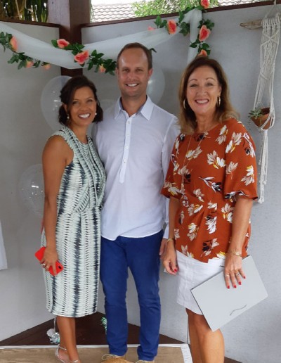 young couple posing for photo with bronwyn brown marriage celebrant
