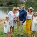 young family posing with bronwyn brown gold coast marriage celebrant